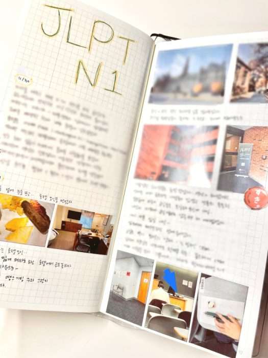 Hobonichi Weeks JLPT N1 study planner notes section with handwritten study logs and attached photo stickers