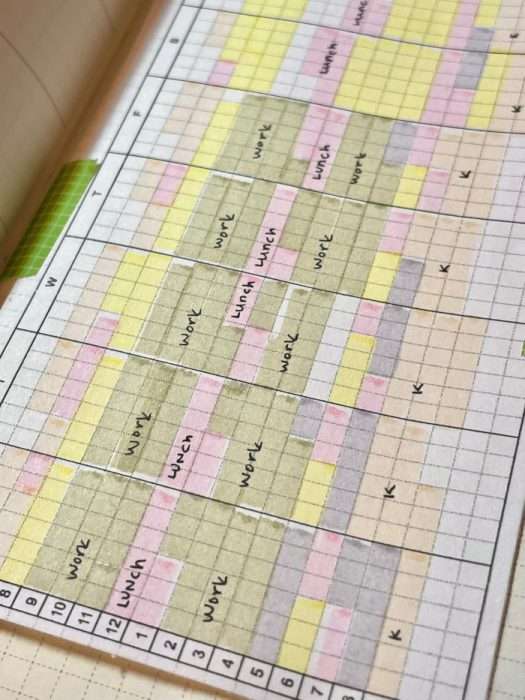 Hobonichi Planner with grid layout showing weekly tracker highlighted in yellow and pink