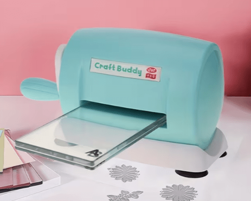 Craft Buddy Mini Manual Die Cutting Machine in Blue/White, Measuring 6.02X4.72X3.74inch; a Portable for Scrapbooking And Card Making
